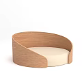 Modern Round Wooden Curved Seat With Light Colored Cushion And Smooth Surface