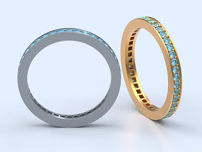 Elegant Silver And Gold Rings Adorned With Sparkling Blue Gemstones Design 3d model