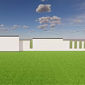 White Feature Wall with Circular Perforated Geometric Pattern Set Against Green Lawn and Blue Sky