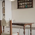 Modern Dining Room Interior With Wooden Table Upholstered Chair And Wall Shelf Decor