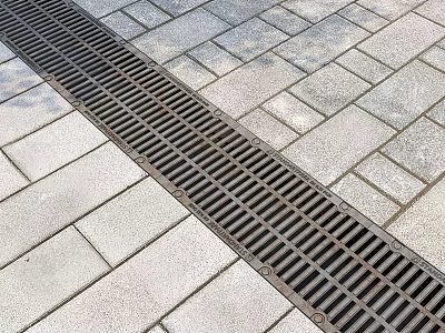 Outdoor Long Metal Drainage Grate On Gray Stone Paver Walkway Surface 3d model