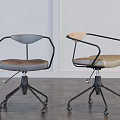 Two Modern Office Chairs with Black Armrests Padded Seats and Swivel Bases