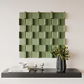 Decorative Ornament Set On Black Table With Green Wall Vase Plants Candles Bowl And Books
