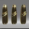 Three Gold Carved Decorative Ornaments With Intricate Patterns And Fine Craftsmanship