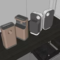 Modern Air Purifiers With Diverse Designs And Colors On Office Desk