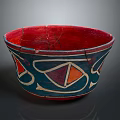 Vintage Red and Blue Decorative Bowl With Geometric Patterns And Cracked Surface