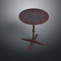 Round Wooden Functional Table With Dark Brown Surface And Cross Leg Design