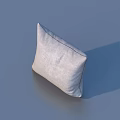 Gray Fabric Pillow With Stitched Edges Placed On Blue Background
