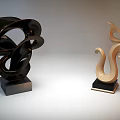 Abstract Modern Sculptures With Curved Design And Black Gold Bases