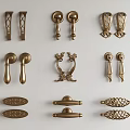 Different Styles of Decorative Metal Door Handles Featuring Ornate and Classic Designs
