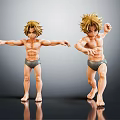 Two Male Character Figures With Blonde Hair In Different Poses Displayed On Reflective Black Surface