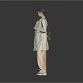Woman Wearing Beige Trench Coat And Brown Pants On Gray Reflective Floor