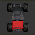 Red Monster Truck With Large Off Road Tires And Black Front Bucket