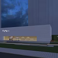 Modern Commercial Building Exterior Design With White Facade Large Glass Windows And Outdoor Seating Area