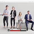 Group of Business Professionals Collaborating with Laptop in Office Setting