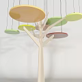 Tree Shaped Decorative Art With Light Wooden Trunk And Hanging Colorful Circular Plates
