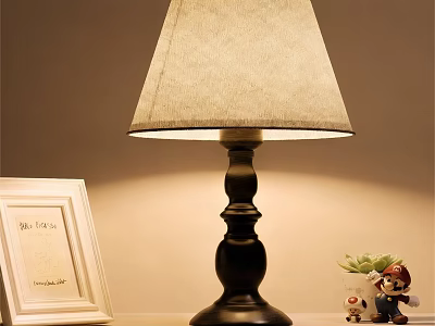 Black Base Table Lamp With Beige Fabric Lampshade White Photo Frame Small Plant Cartoon Figurine 3d model