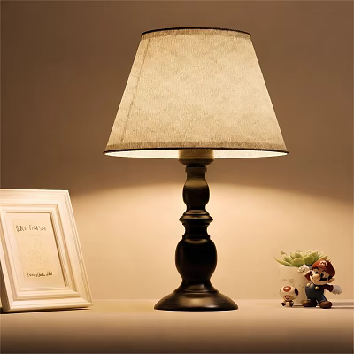Black Base Table Lamp With Beige Fabric Lampshade White Photo Frame Small Plant Cartoon Figurine 3d model