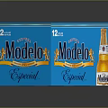 Display Of Modelo Special Beer Bottles And Blue Packaging Boxes On Reflective Surface