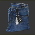 Blue Denim Jeans Stacked Folded With Brand Tag Fashion Apparel Item