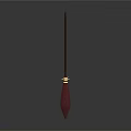 Red Pleated Brush With Brown Long Handle And Golden Decoration On Dark Background