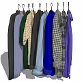 Various Colorful Clothes with Different Styles and Patterns Hanging on Hangers