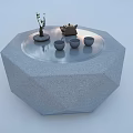 Modern Kitchen Electric Teapot On Gray Octagonal Stone Platform With Teacups And Small Plant