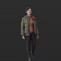 A Woman In Green Hooded Puffer Jacket With Orange Lining Brown Sweater And Black Pants