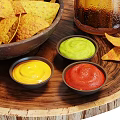 Crispy Tortilla Chips With Assorted Dipping Sauces And Cold Beer On Wooden Tray