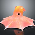 Orange and Pink Octopus Like Creature With Large Eye And Wing Shaped Tentacles