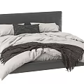 Modern Double Bed with Grey Headboard White Duvet Pillows Checkered Cushion and Dark Brown Throw