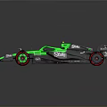Green And Black Caterham Formula 1 Car With Red Accented Wheels And Yellow Helmet