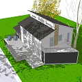 Modern Single Family Home With White Exterior Black Windows Patio Railing And Green Lawn