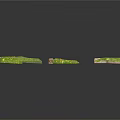 Three Green Grass Covered Arched Garden Decor Pieces With Stone Edges