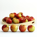 Fresh Ripe Red and Yellow Apples Placed on a Wooden Serving Tray