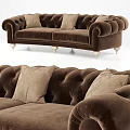 Brown Tufted Two Seater Sofa With Decorative Pillows And Gold Legs