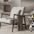 Modern Single Seater Sofa with Wooden Armrest Throw Blanket Side Table Fruits and Potted Plant
