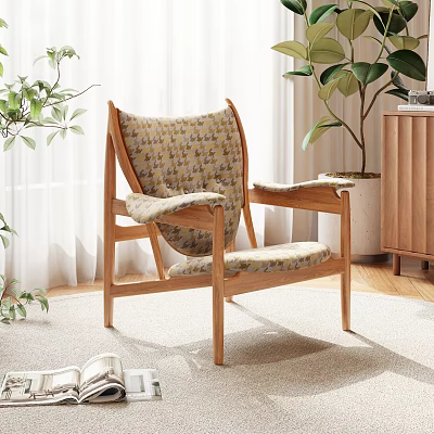 Accent Chair with Wooden Frame and Patterned Cushion in Interior with Plants and Natural Light 3d model