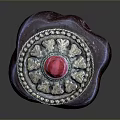 Red Vessel With Silver Decorated Lid And Red Gemstone On Dark Background