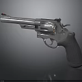 Silver Metallic Revolver With Textured Grip And Shiny Barrel Design