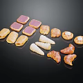 Assorted Pastries With Various Shapes And Colors Arranged On Black Surface