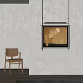 Beige Wall Interior With Hanging Abstract Artwork And Wooden Chair