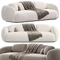Modern Multi Seater Sofa in Neutral Tones with Cozy Blanket and Decorative Pillows