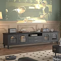 Vintage Black TV Stand With Glass Doors Storage And Decorative Ornaments On Retro Background