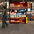 Vibrant Commercial Street At Night With Shops Pedestrians And Outdoor Seating