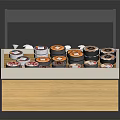 Showcase Shelf With Wooden Base Gray Top Black Signage And Assorted Desserts Clear Bottled Drinks