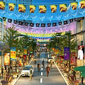 Bustling Commercial Street With Colorful Decorations Pedestrians Shops Trees Street Lamps And Cars