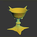 Golden Decorative Cup With Star Shaped Base Red Accents And Petal Like Rim