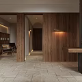 Hotel Public Lounge Area With Wooden Walls Stone Floor And Wall Mounted Lights
