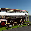 Double Decker Bus Transformed Into Outdoor Leisure Space With Seats Grass And Tree